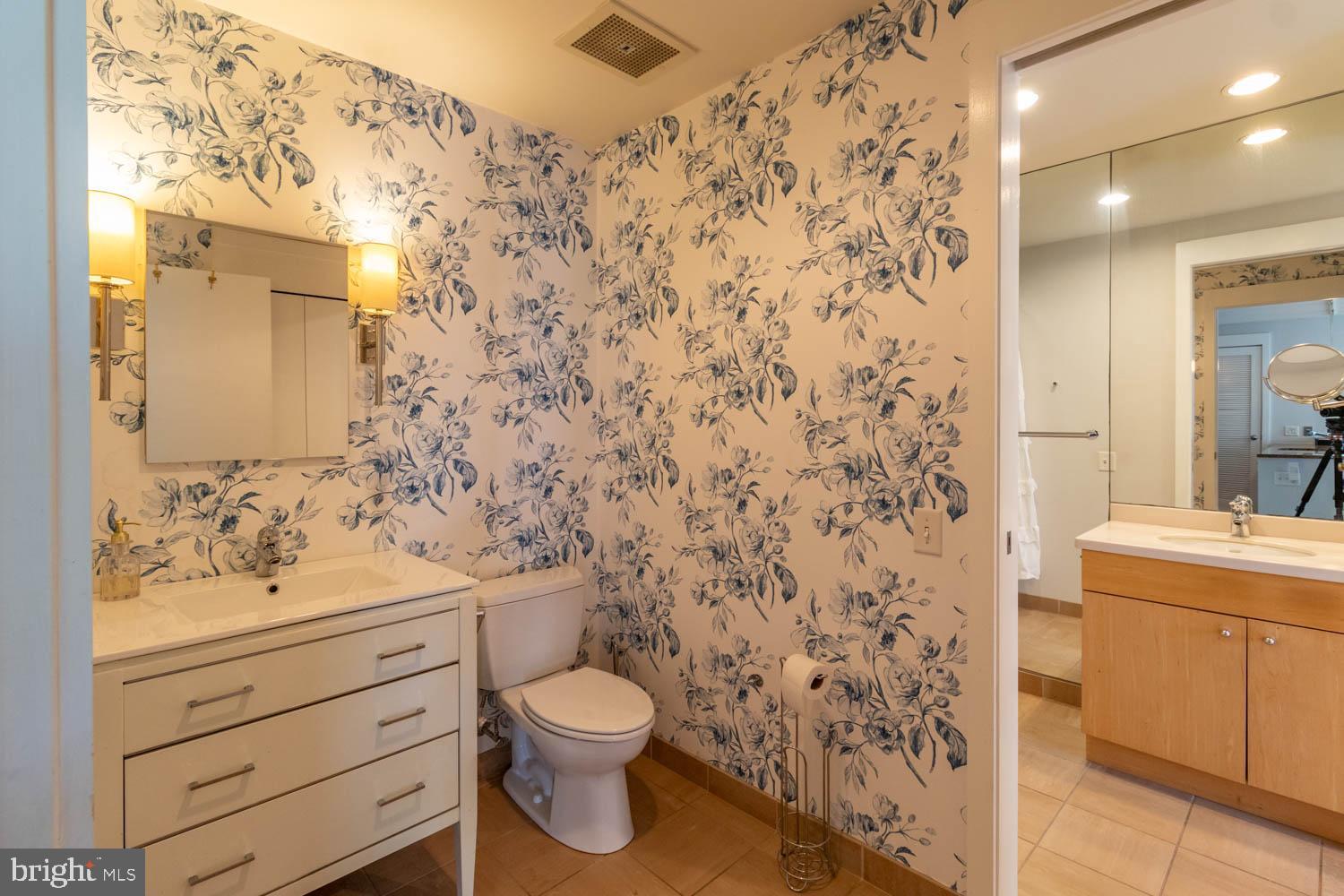 317-319 Vine Street, Unit 308 Philadelphia, PA 19106 - Photo 8 of 17 a bathroom with a sink toilet and shower