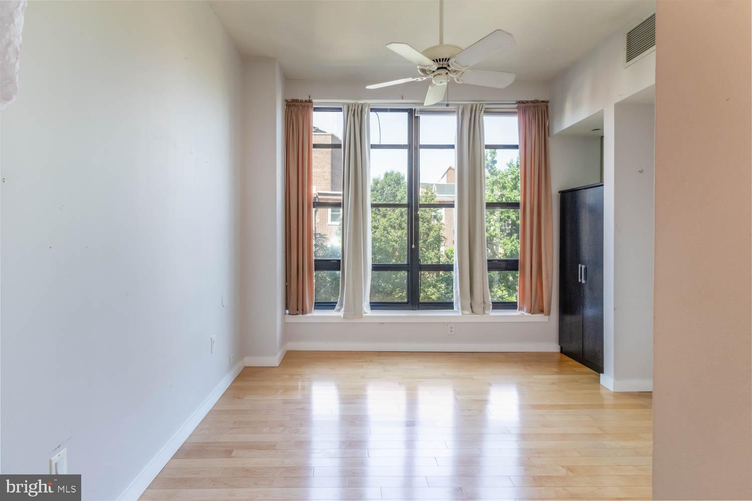 317-319 Vine Street, Unit 308 Philadelphia, PA 19106 - Photo 9 of 17 a view of an empty room with a window