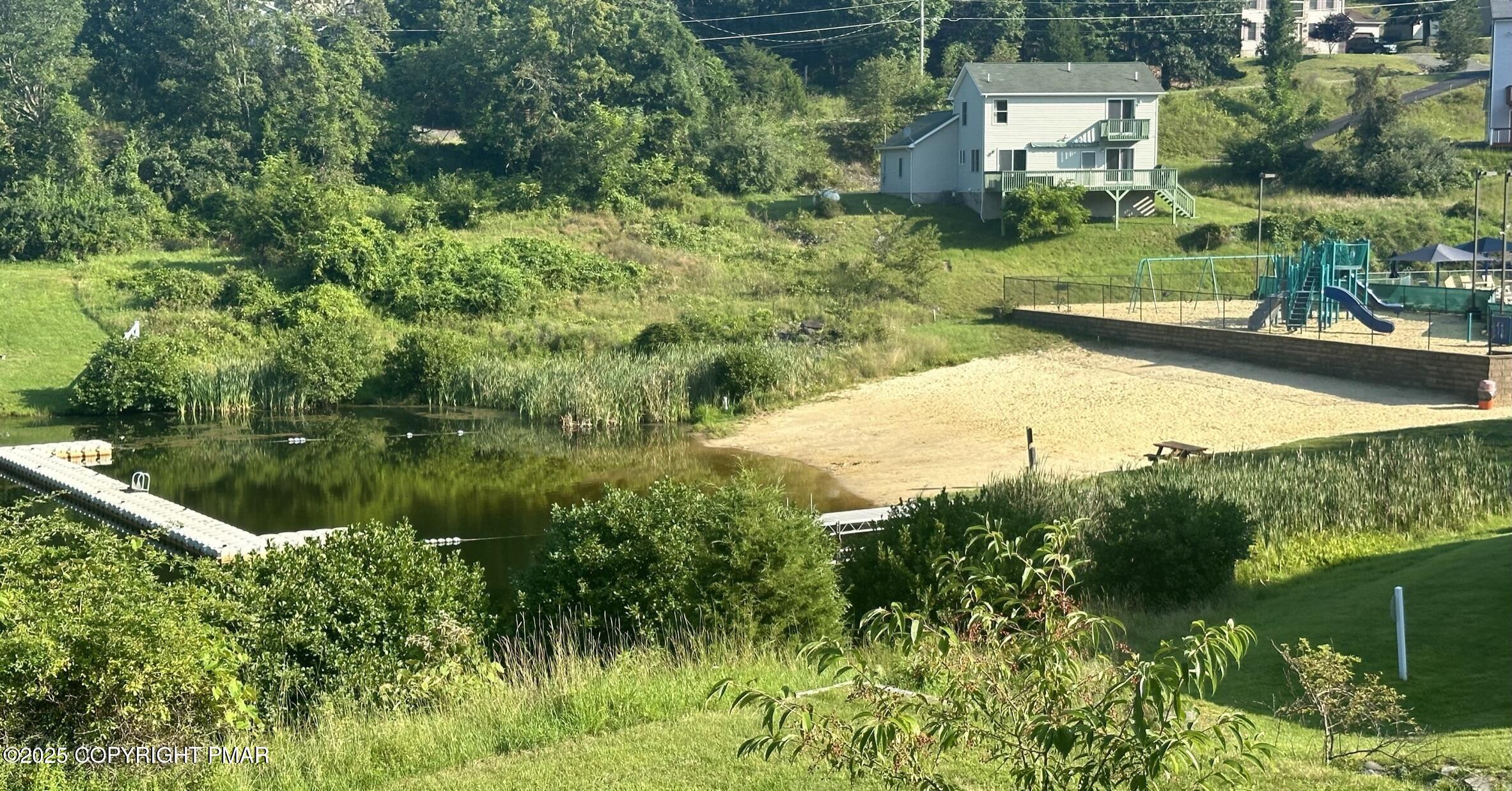 Lot 695 Decker Road Bushkill, PA 18324 - Photo 16 of 55 a view of a garden with a lake