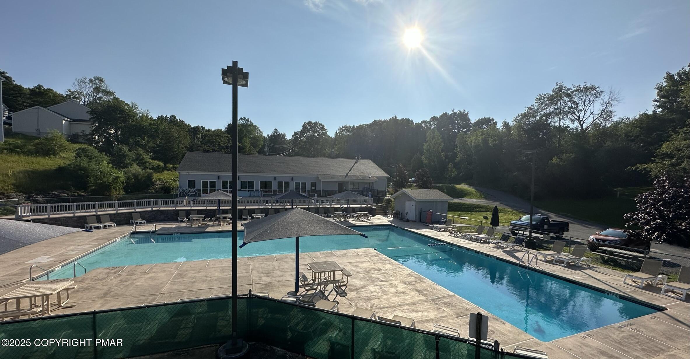Lot 695 Decker Road Bushkill, PA 18324 - Photo 22 of 55 a view of a swimming pool with a patio and a yard