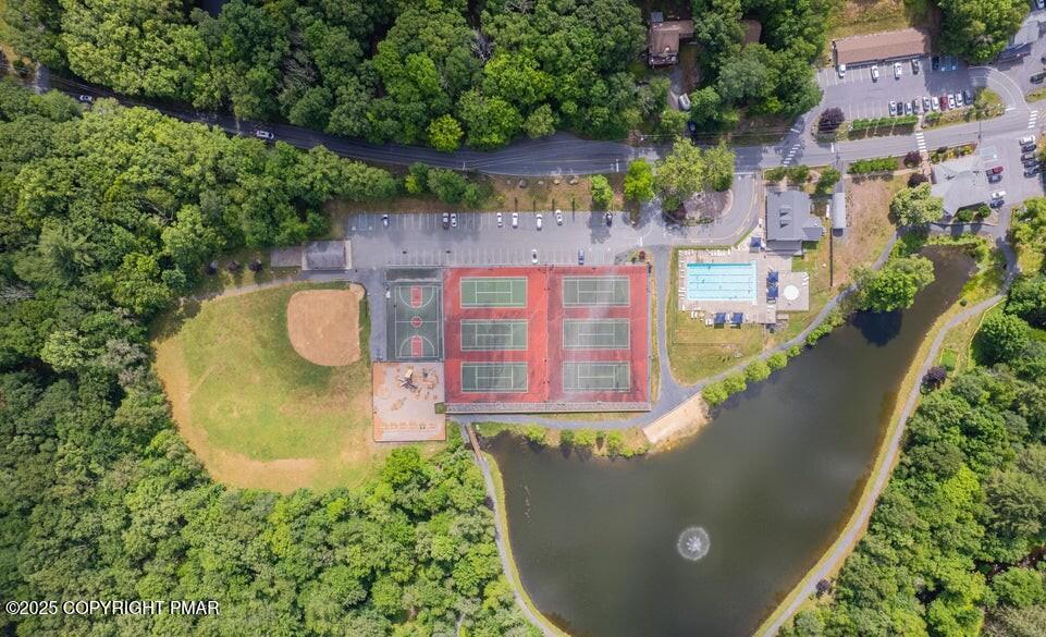 Lot 695 Decker Road Bushkill, PA 18324 - Photo 32 of 55 an aerial view of a house with a swimming pool