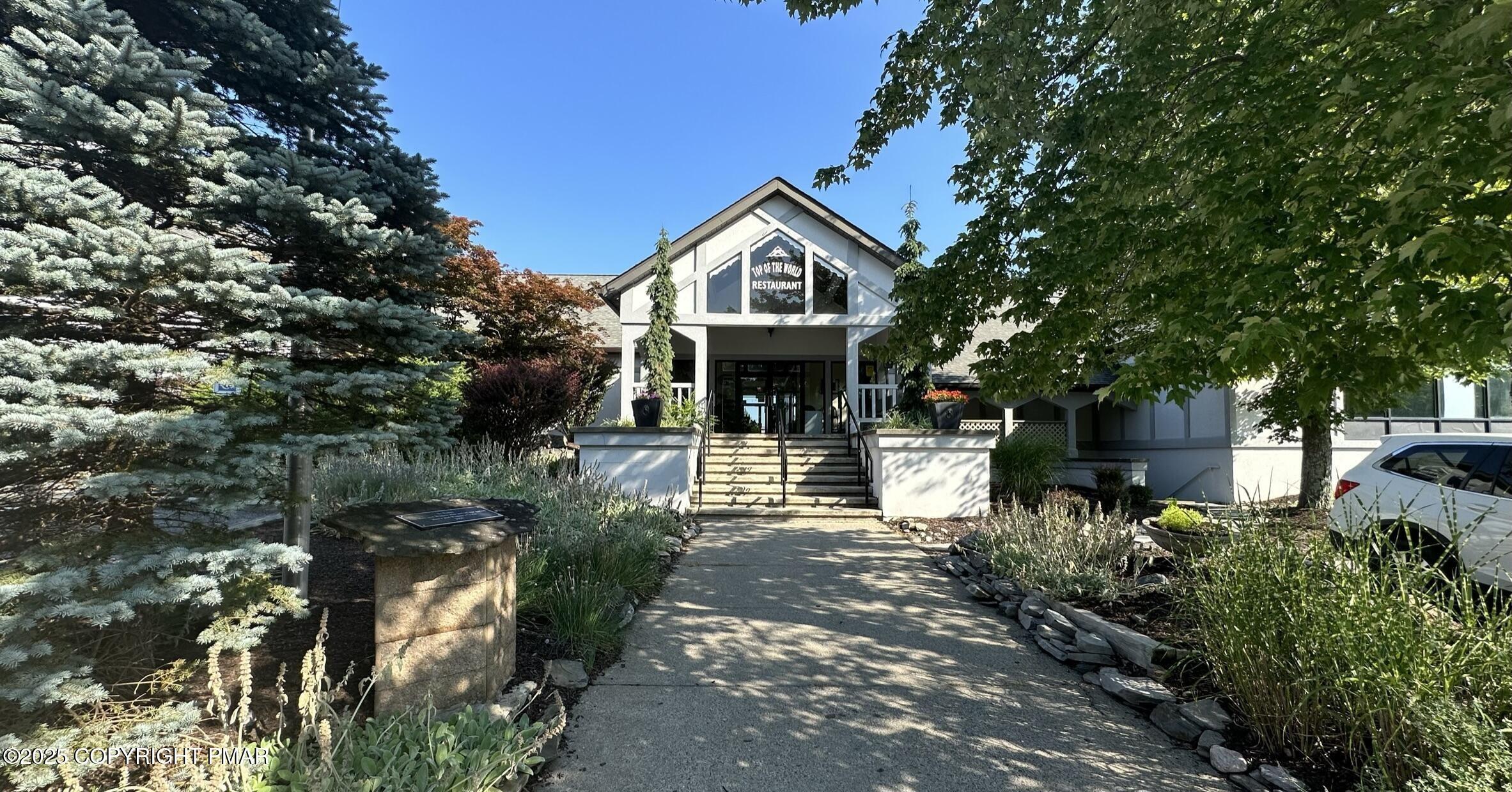 Lot 695 Decker Road Bushkill, PA 18324 - Photo 47 of 55 a front view of a house with garden