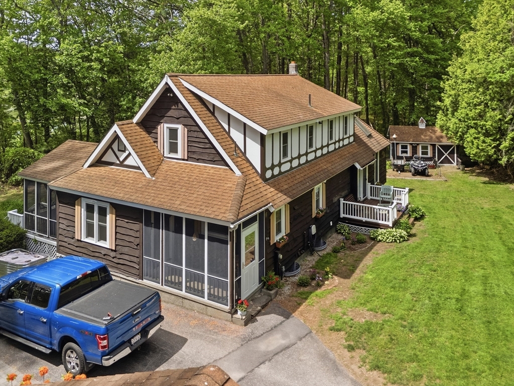 43 Flint Road Tyngsborough, MA 01879 - Photo 3 of 40 a aerial view of a house with swimming pool and deck