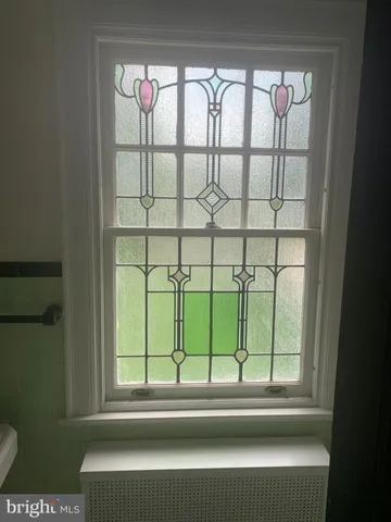 a bathroom with a toilet and a sink