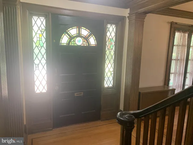 a view of empty room with windows