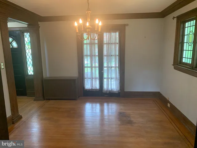 a view of livingroom with hardwood floor and window
