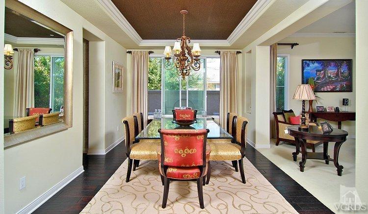 1373 Hidden Ranch Drive Simi Valley, CA 93063 - Photo 12 of 50 a dining room with furniture wooden floor and a chandelier