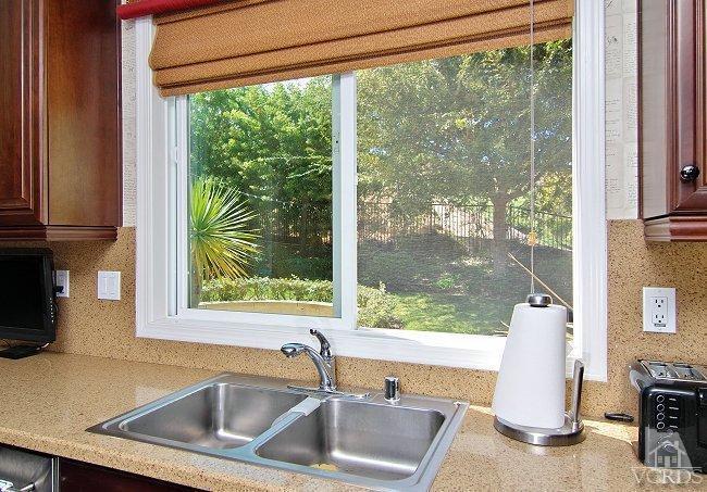 1373 Hidden Ranch Drive Simi Valley, CA 93063 - Photo 21 of 50 a bathroom with sink and window