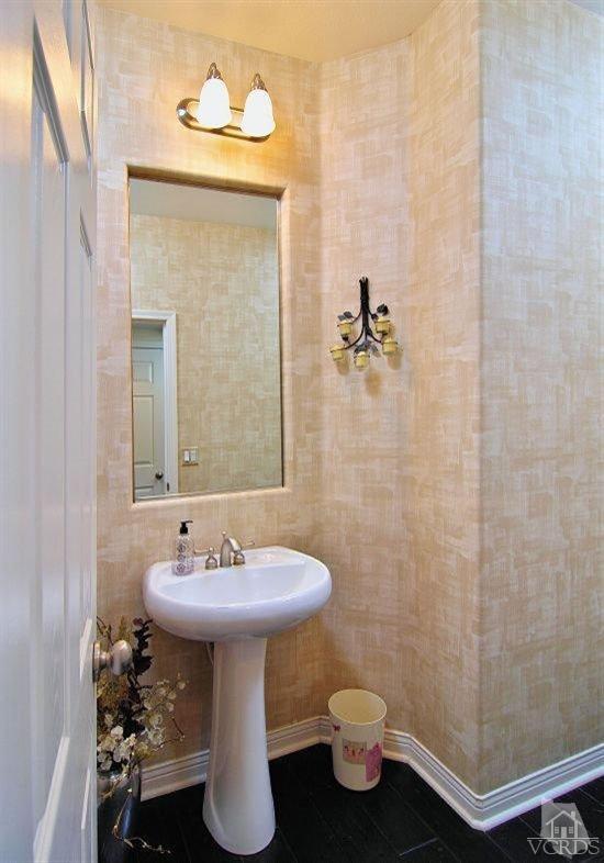 1373 Hidden Ranch Drive Simi Valley, CA 93063 - Photo 23 of 50 a bathroom with a sink toilet and shower