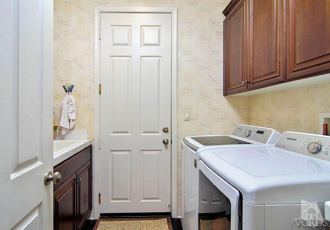 1373 Hidden Ranch Drive Simi Valley, CA 93063 - Photo 24 of 50 a utility room with cabinets