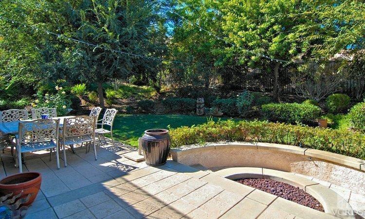 1373 Hidden Ranch Drive Simi Valley, CA 93063 - Photo 4 of 50 a view of a swimming pool with chairs in patio
