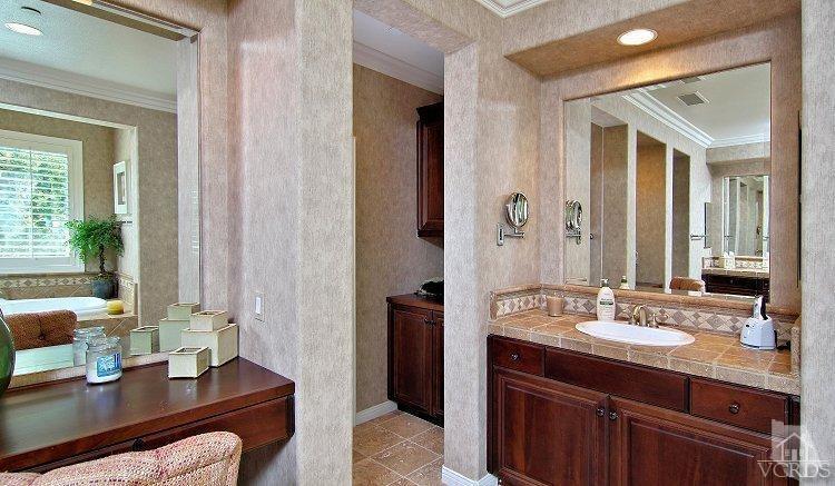 1373 Hidden Ranch Drive Simi Valley, CA 93063 - Photo 42 of 50 a bathroom with a sink double vanity and a mirror