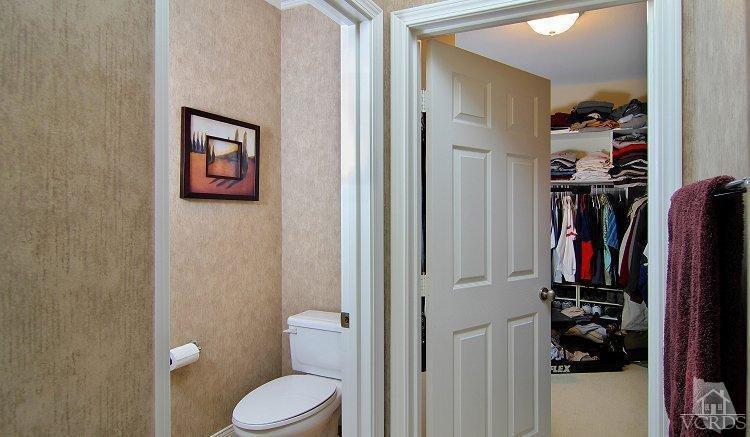 1373 Hidden Ranch Drive Simi Valley, CA 93063 - Photo 43 of 50 a bathroom with a toilet and a shower