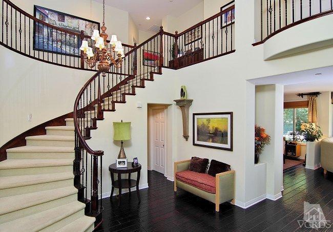 1373 Hidden Ranch Drive Simi Valley, CA 93063 - Photo 8 of 50 a living room with furniture and stairs