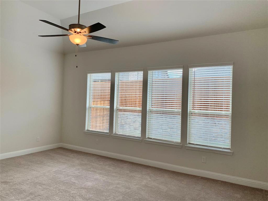 822 Susan Street Anna, TX 75409 - Photo 12 of 20 a view of an empty room with a window
