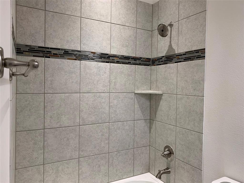 822 Susan Street Anna, TX 75409 - Photo 15 of 20 a bathroom with a shower and a shower