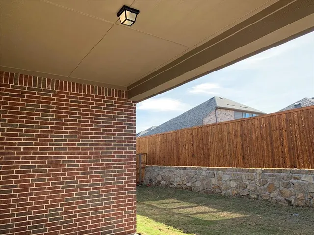 a view of a backyard of a house