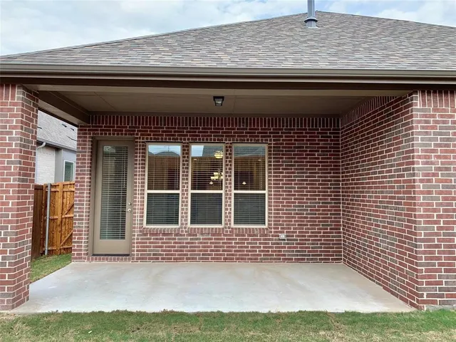 a view of outdoor space with sign board and yard