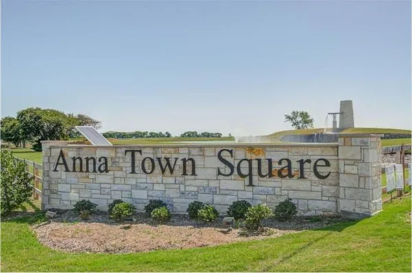 a view of a swimming pool with an outdoor seating