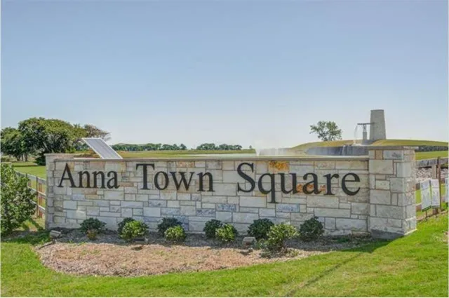 a view of a swimming pool with an outdoor seating