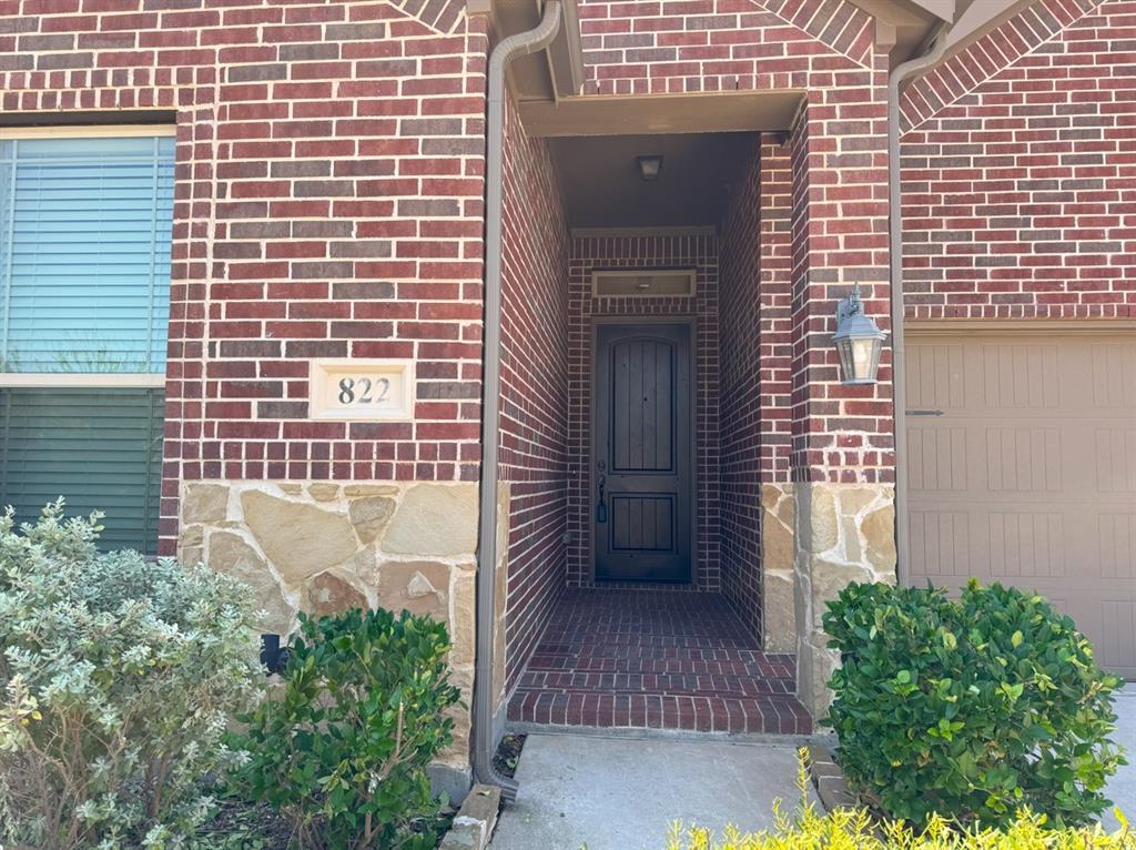 822 Susan Street Anna, TX 75409 - Photo 3 of 20 a view of a door and a window