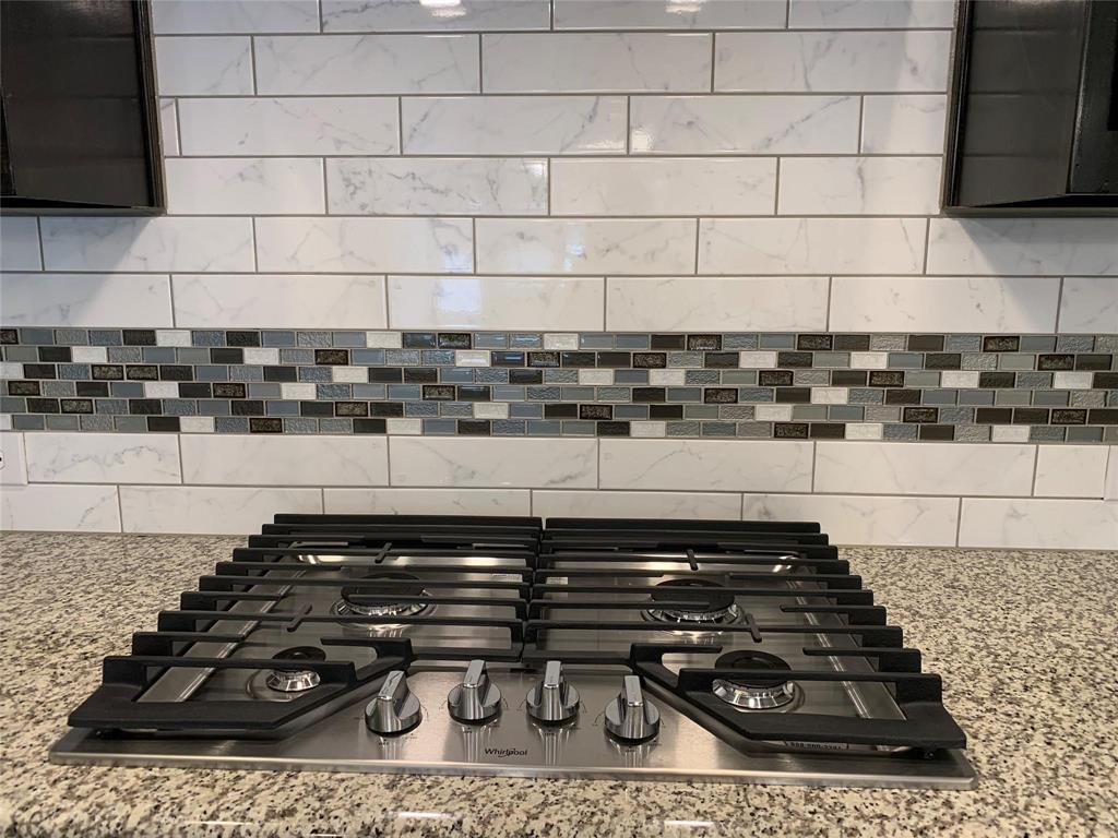 822 Susan Street Anna, TX 75409 - Photo 9 of 20 a close view of a stove a oven and a sink