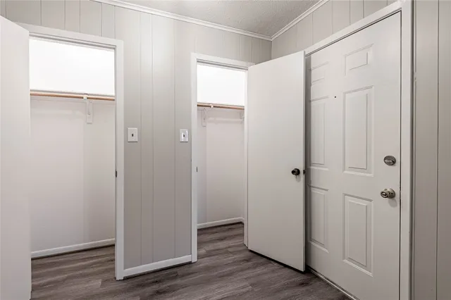 a kitchen with a stove a sink and a refrigerator