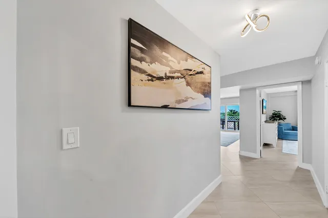 a view of a hallway with workspace