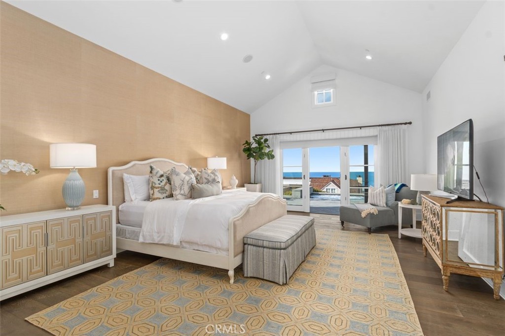 19 Seabreeze Terrace Dana Point, CA 92629 - Photo 19 of 40 a bed room with bed and a couch