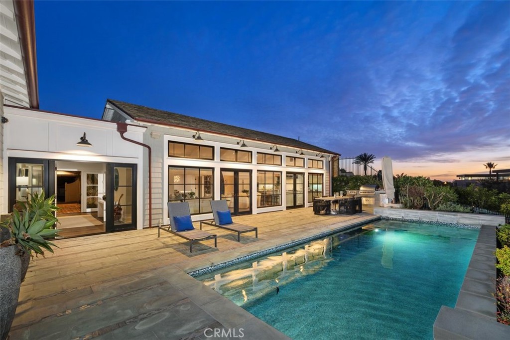 19 Seabreeze Terrace Dana Point, CA 92629 - Photo 31 of 40 a view of a house with swimming pool and porch with furniture