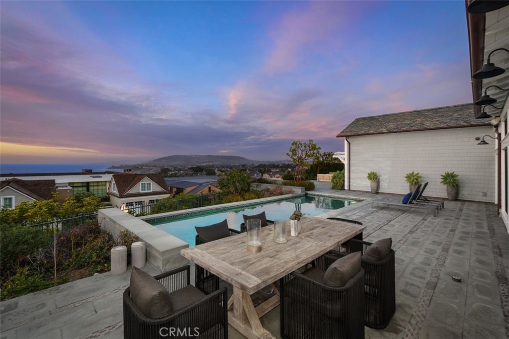 19 Seabreeze Terrace Dana Point, CA 92629 - Photo 33 of 40 a view of an outside dining space with furniture