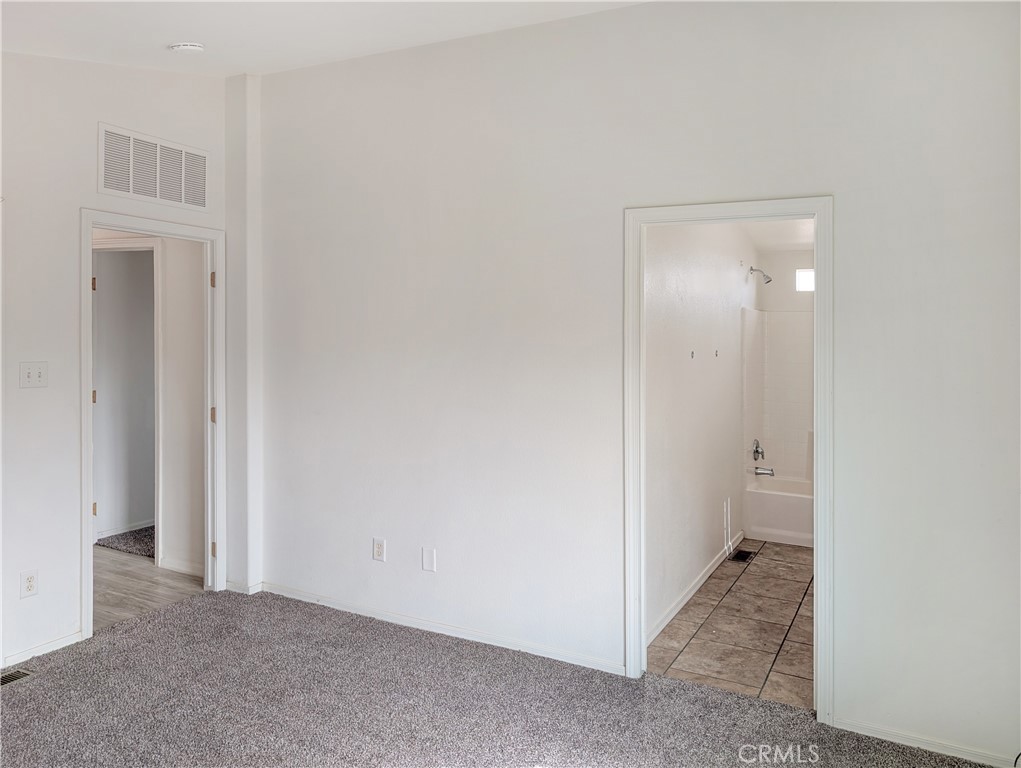 17647 Palowalla Road Blythe, CA 92225 - Photo 16 of 23 a view of an empty room with a bathroom