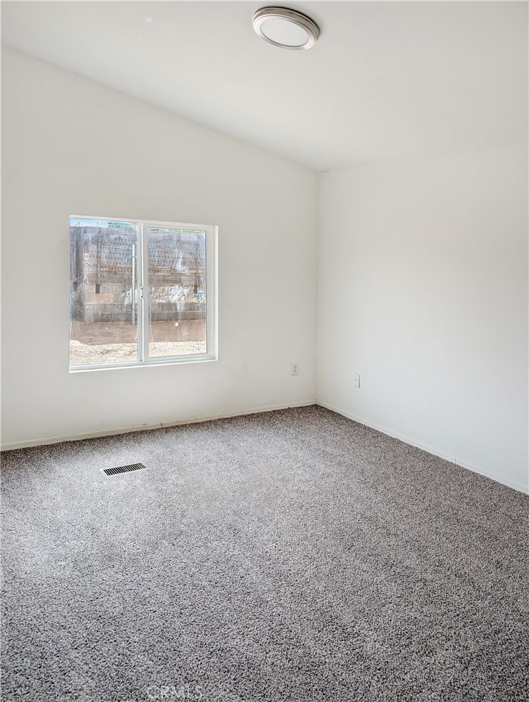 17647 Palowalla Road Blythe, CA 92225 - Photo 18 of 23 an empty room with a window