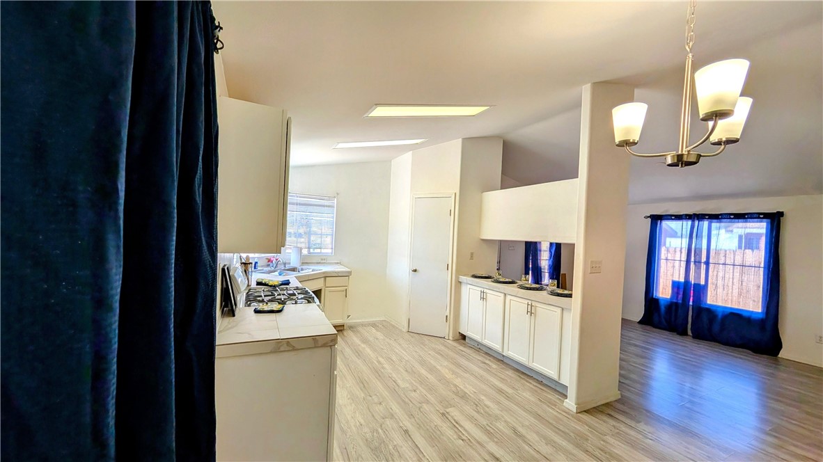 17647 Palowalla Road Blythe, CA 92225 - Photo 5 of 23 a view of a living room and a kitchen