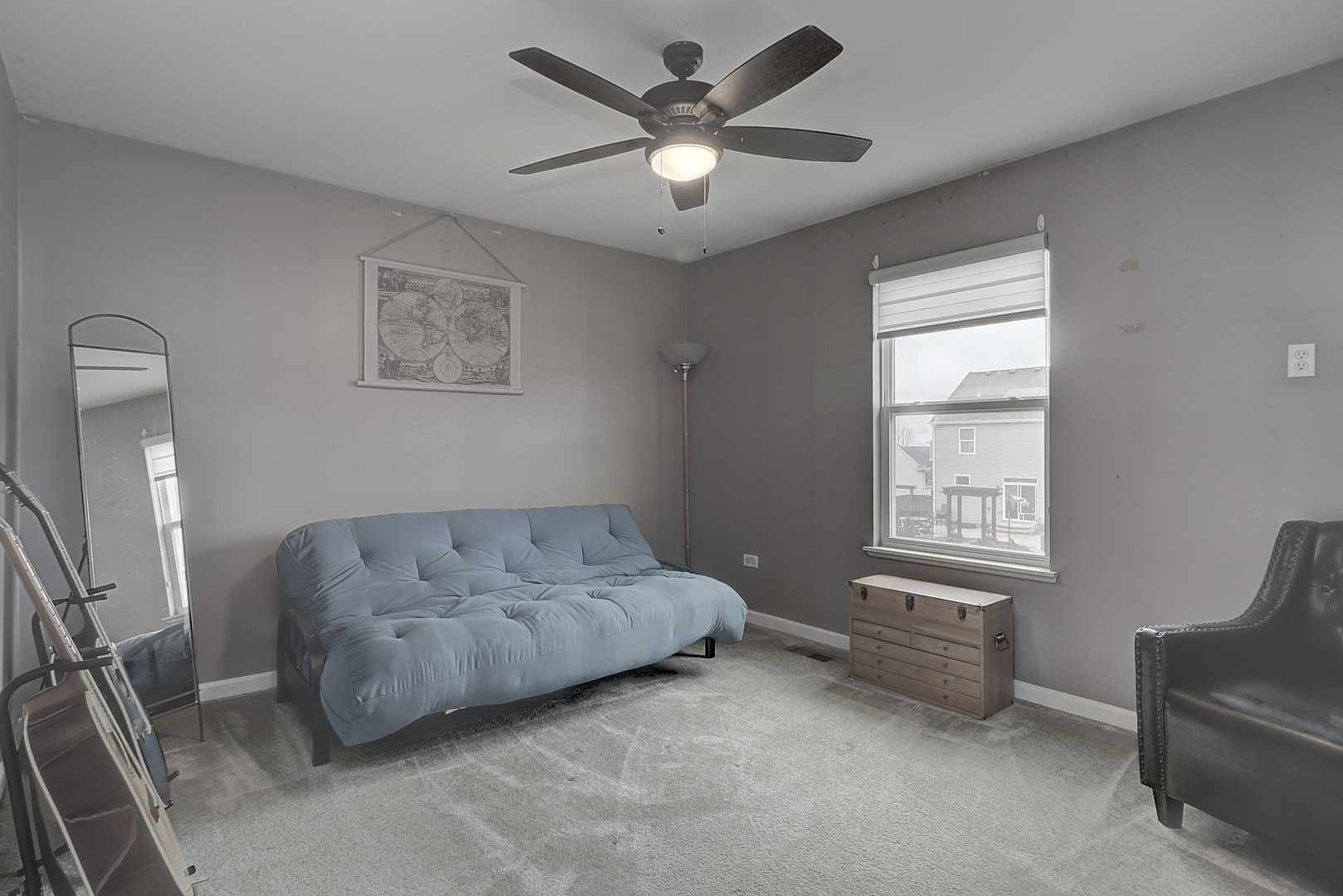 1809 Wesley Court Joliet, IL 60431 - Photo 18 of 29 a living room with furniture and a ceiling fan