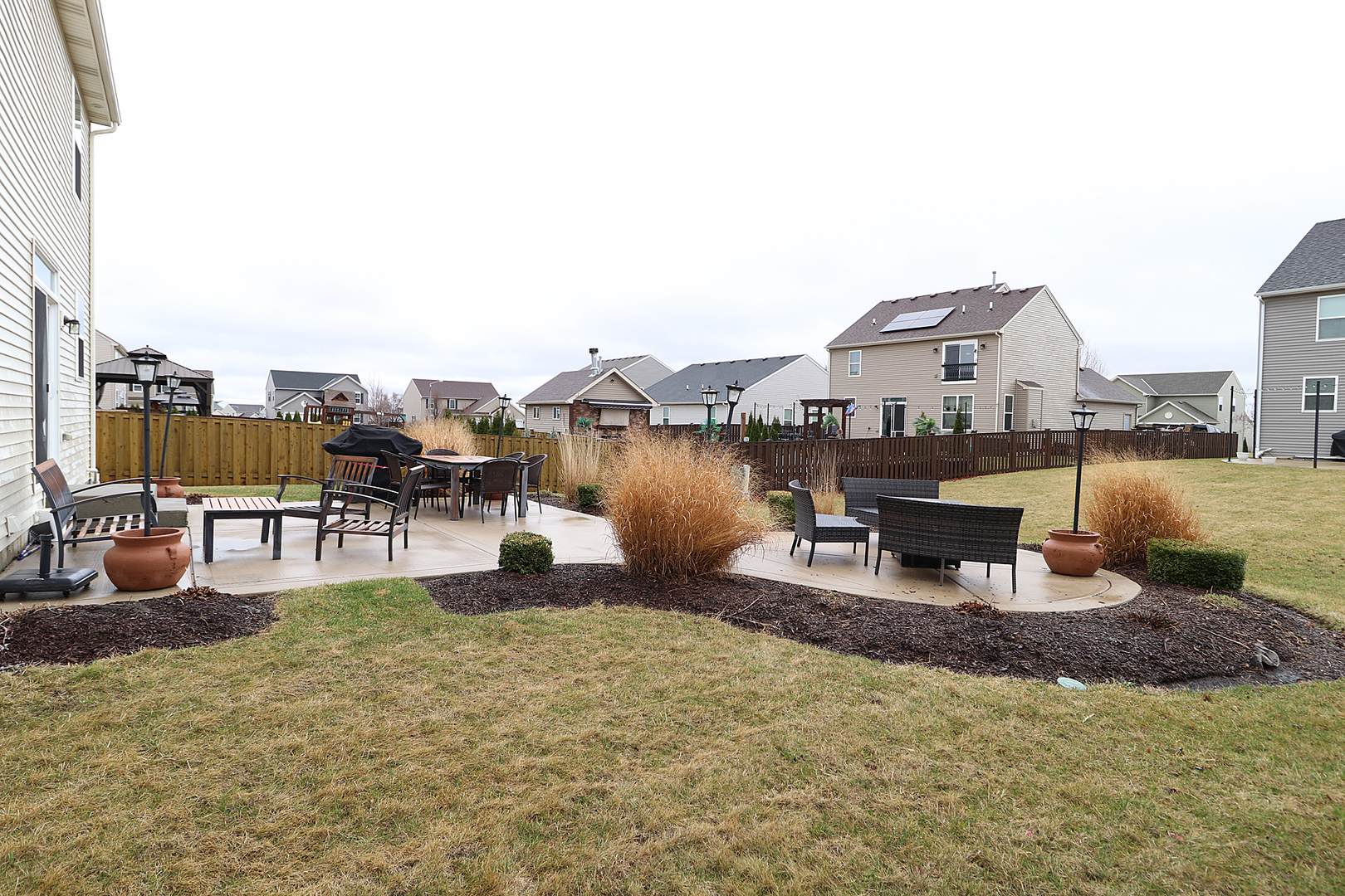 1809 Wesley Court Joliet, IL 60431 - Photo 23 of 29 a swimming pool with outdoor seating and yard