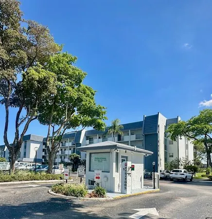 a view of street with parked cars