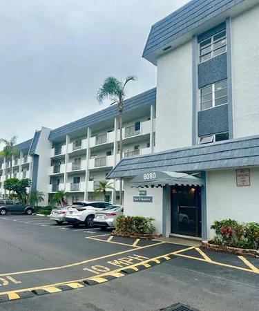 a car parked in front of a building