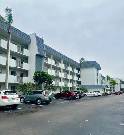 a view of a livingroom with furniture and furniture