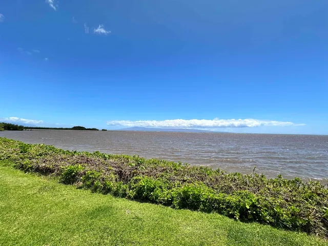 a view of a lake and sunset