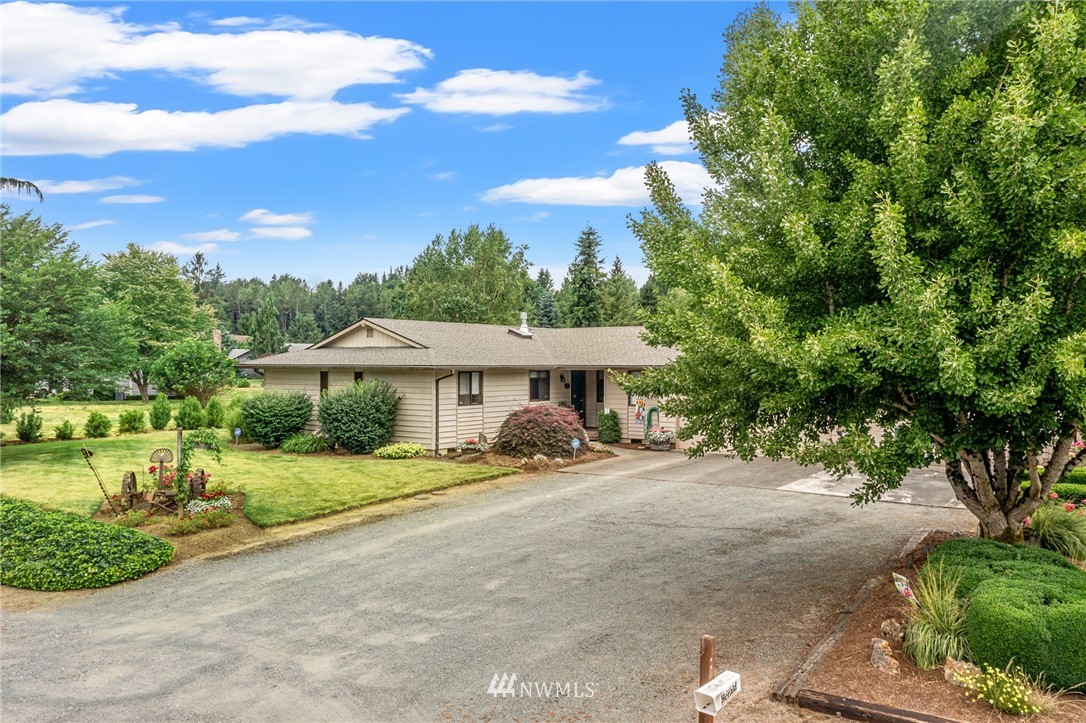 25431 Cromwell Road Monroe, WA 98272 - Photo 2 of 40 a view of a house with a yard