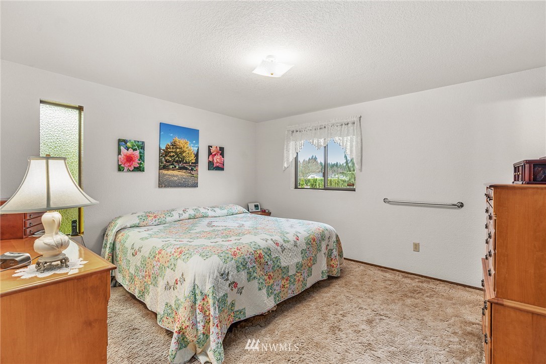 25431 Cromwell Road Monroe, WA 98272 - Photo 13 of 40 a bedroom with a bed and a window