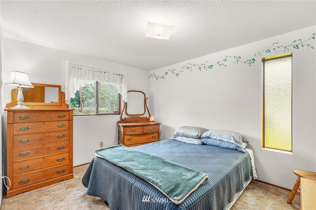 25431 Cromwell Road Monroe, WA 98272 - Photo 18 of 40 a bedroom with a bed and window