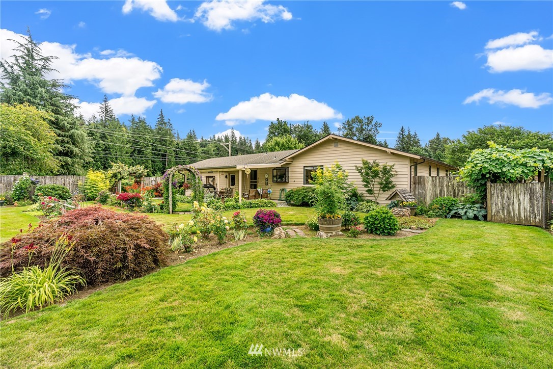 25431 Cromwell Road Monroe, WA 98272 - Photo 26 of 40 a view of an house with backyard space and balcony