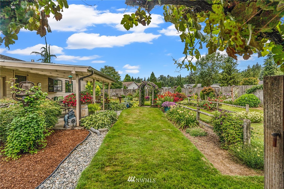 25431 Cromwell Road Monroe, WA 98272 - Photo 35 of 40 a view of a garden with large trees