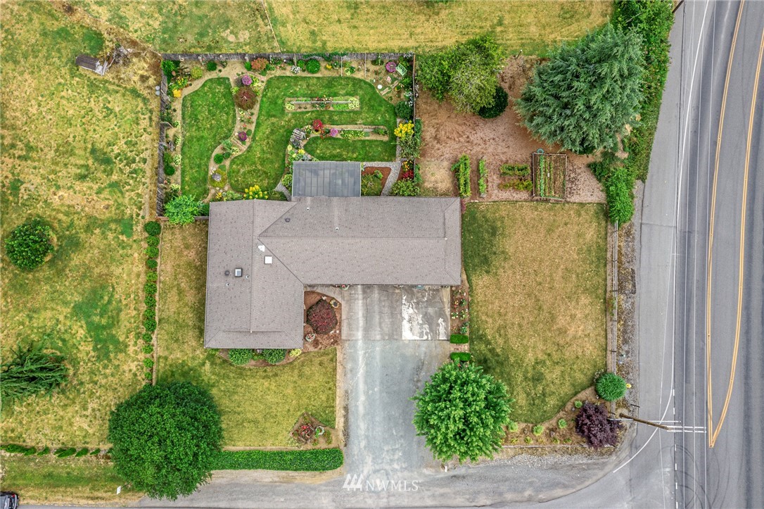 25431 Cromwell Road Monroe, WA 98272 - Photo 38 of 40 aerial view of a house with a yard and potted plants