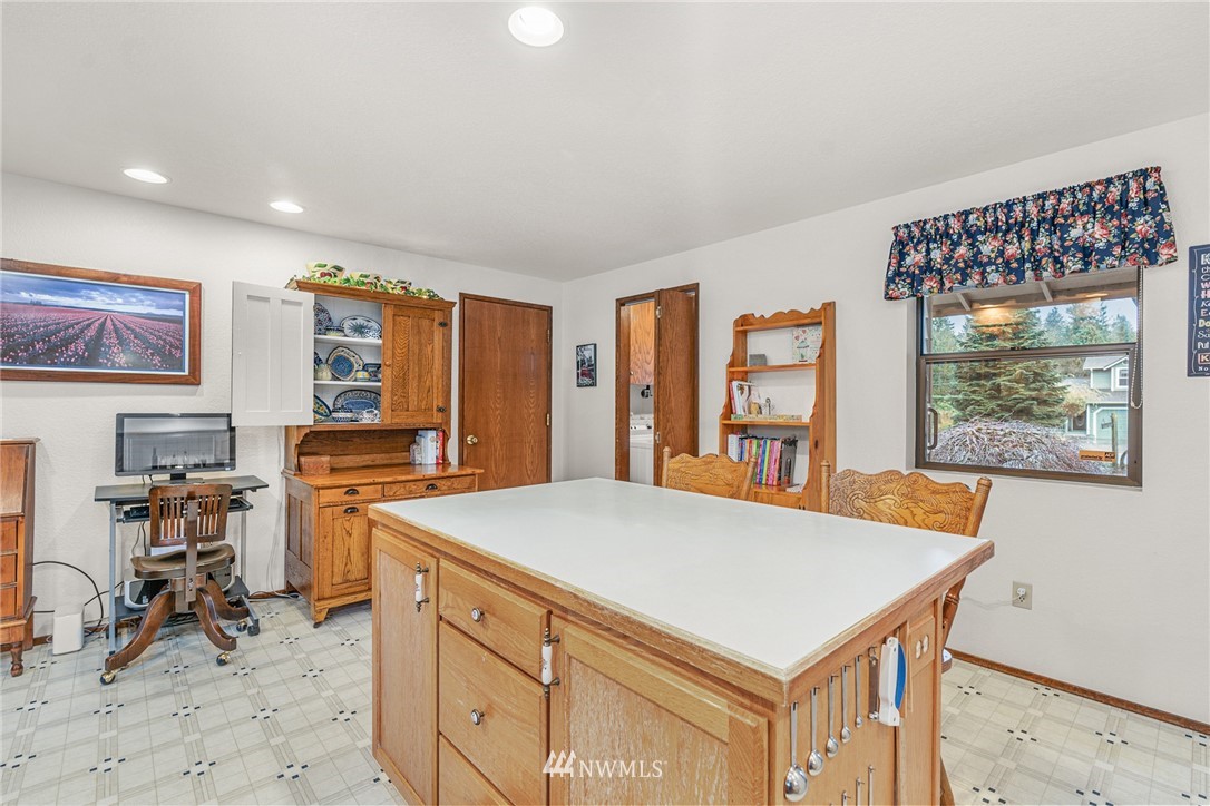 25431 Cromwell Road Monroe, WA 98272 - Photo 7 of 40 a view of a kitchen with workspace and windows