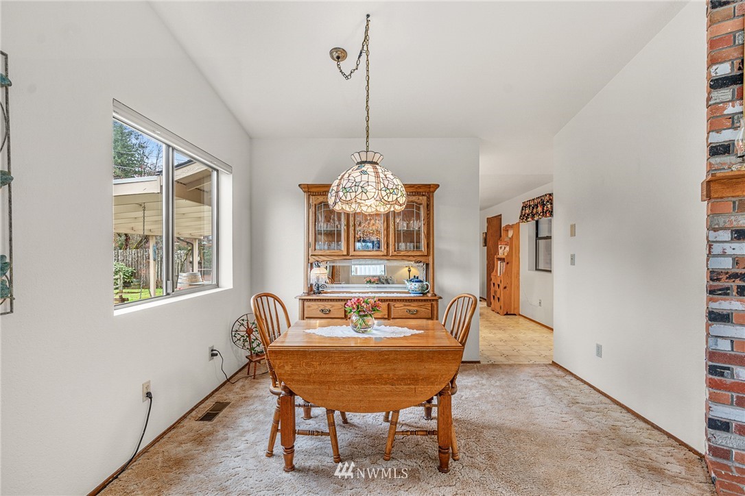 25431 Cromwell Road Monroe, WA 98272 - Photo 9 of 40 a view of a dining room with furniture window and outside view