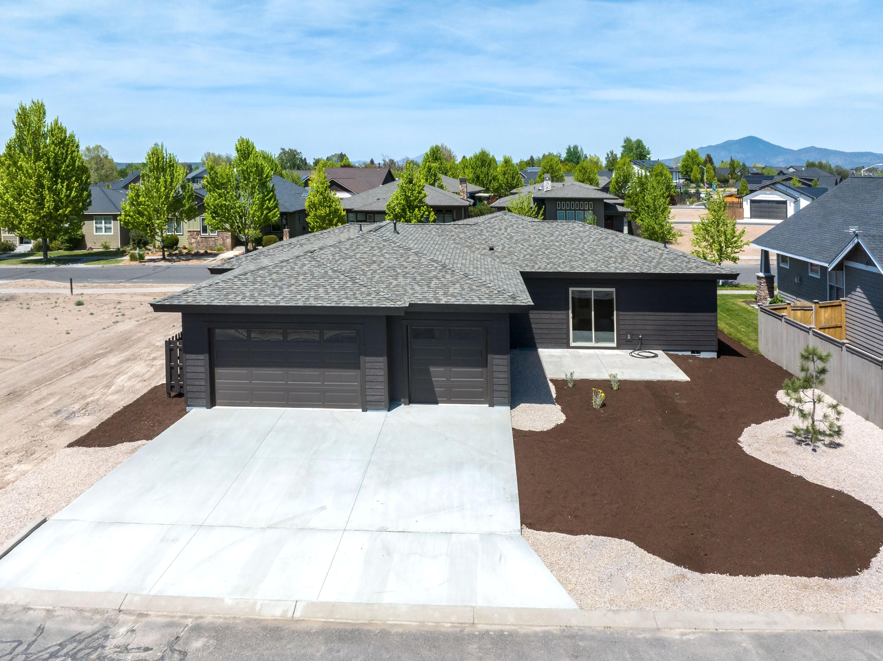1472 Northeast Hudspeth Road Prineville, OR 97754 - Photo 26 of 26 a view of a house with a swimming pool