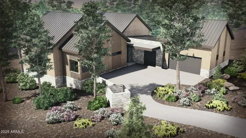 a view of a house with a yard and a garden